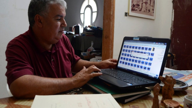 Man Using Laptop